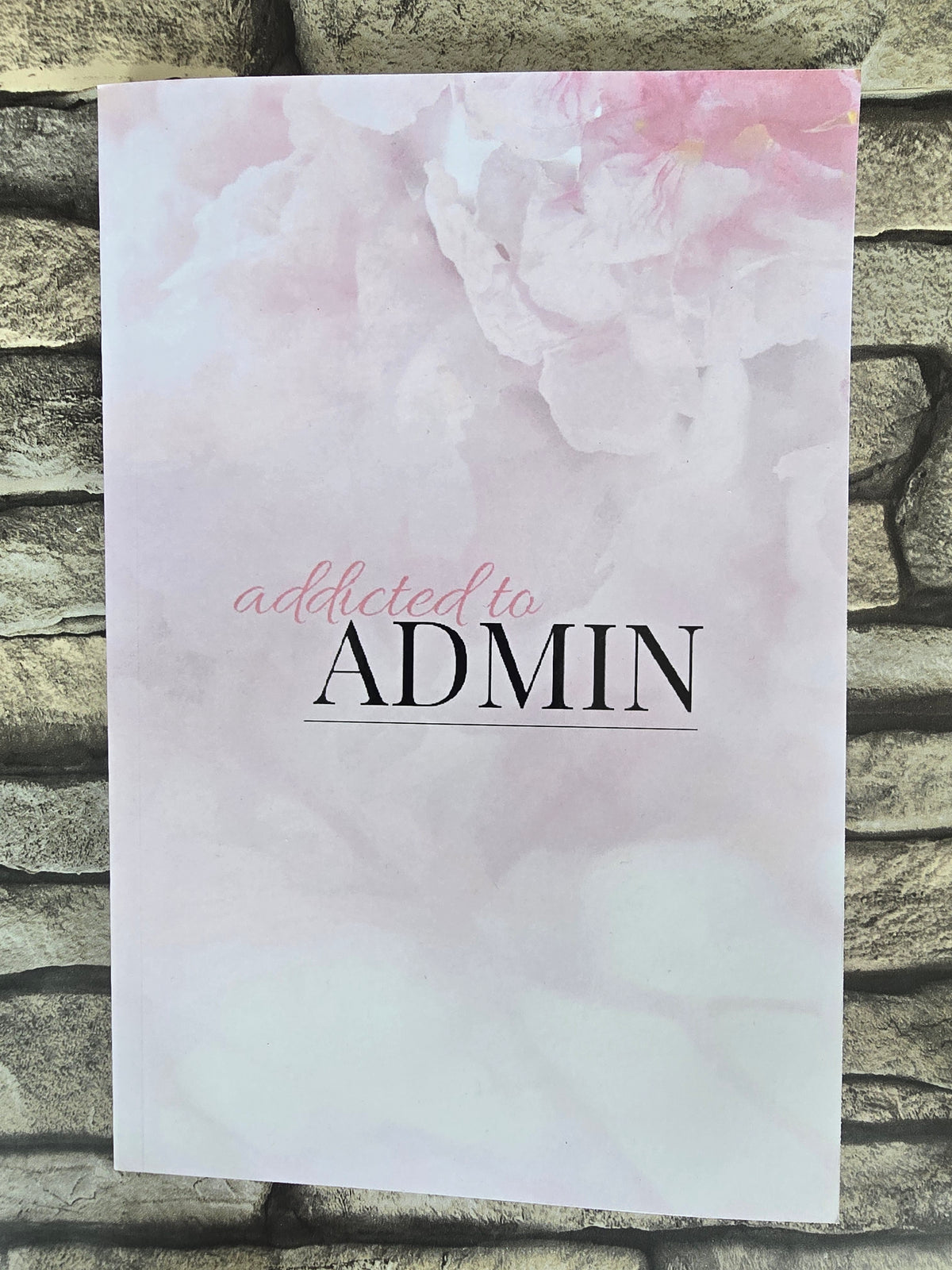 A5 pink floral notebook with glossy pastel cover and lined pages, pretty stationery gift for writing or notes.