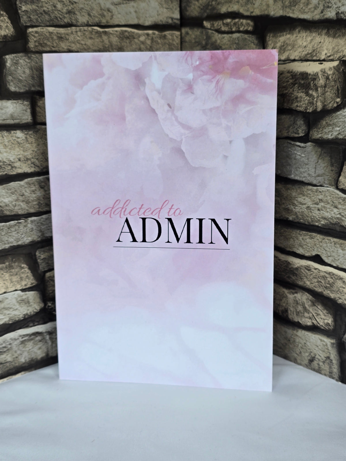 A5 pink floral notebook with glossy pastel cover and lined pages, pretty stationery gift for writing or notes.