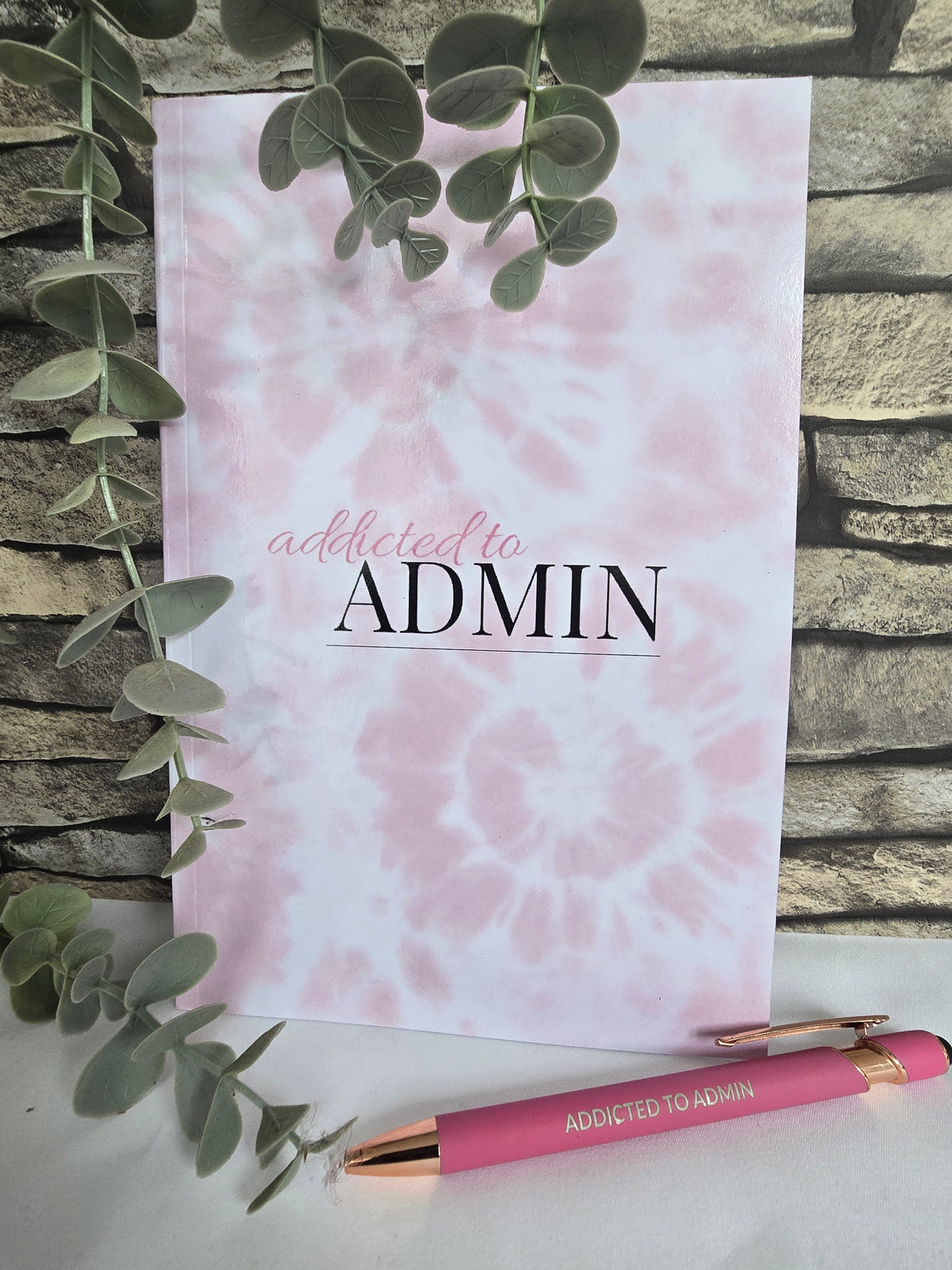 A5 pink tie dye notebook with glossy cover and lined pages, perfect for journaling or stationery lovers.