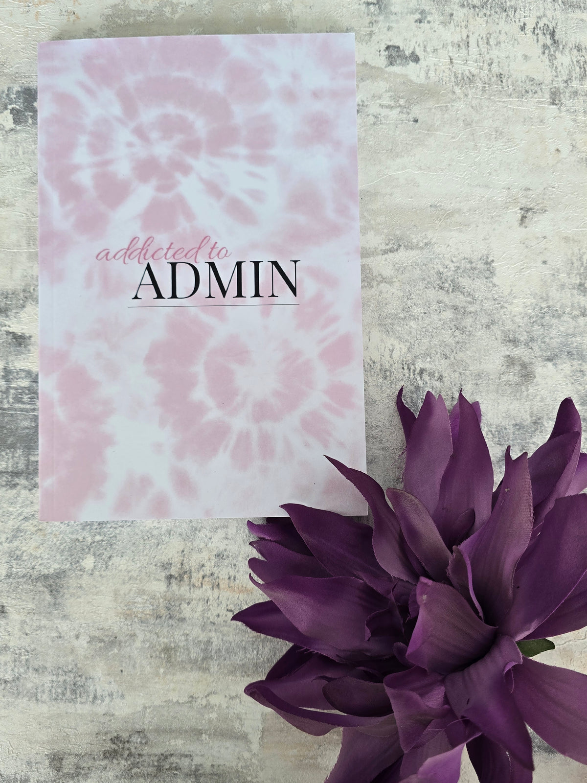 A5 pink tie dye notebook with glossy cover and lined pages, perfect for journaling or stationery lovers.