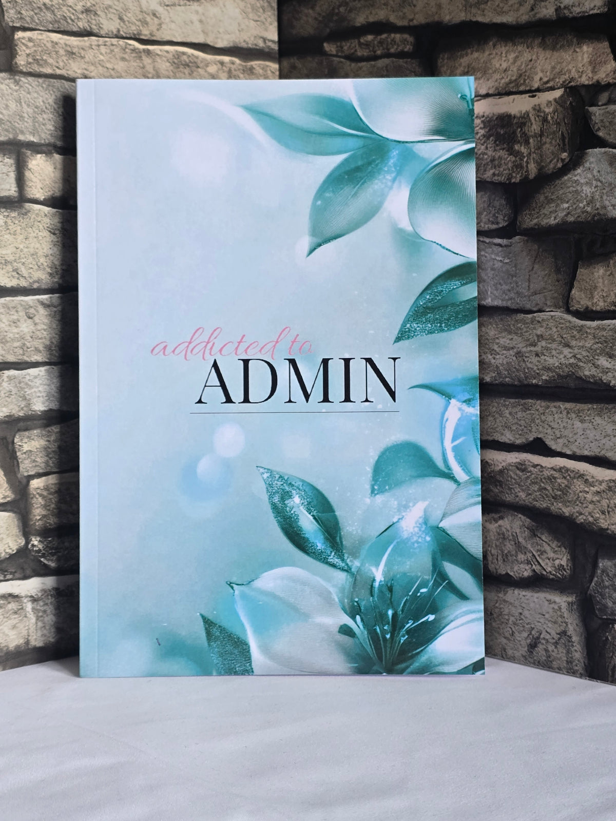 A5 bold teal notebook with glossy cover and lined pages, clean modern stationery for everyday notes.