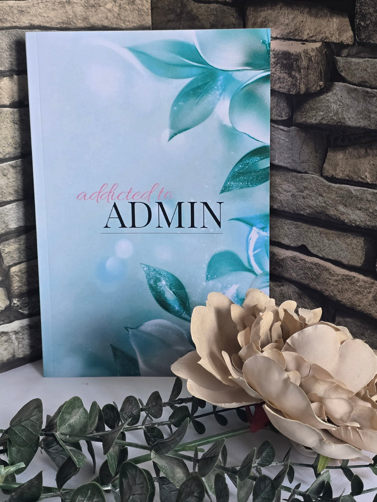 A5 bold teal notebook with glossy cover and lined pages, clean modern stationery for everyday notes.